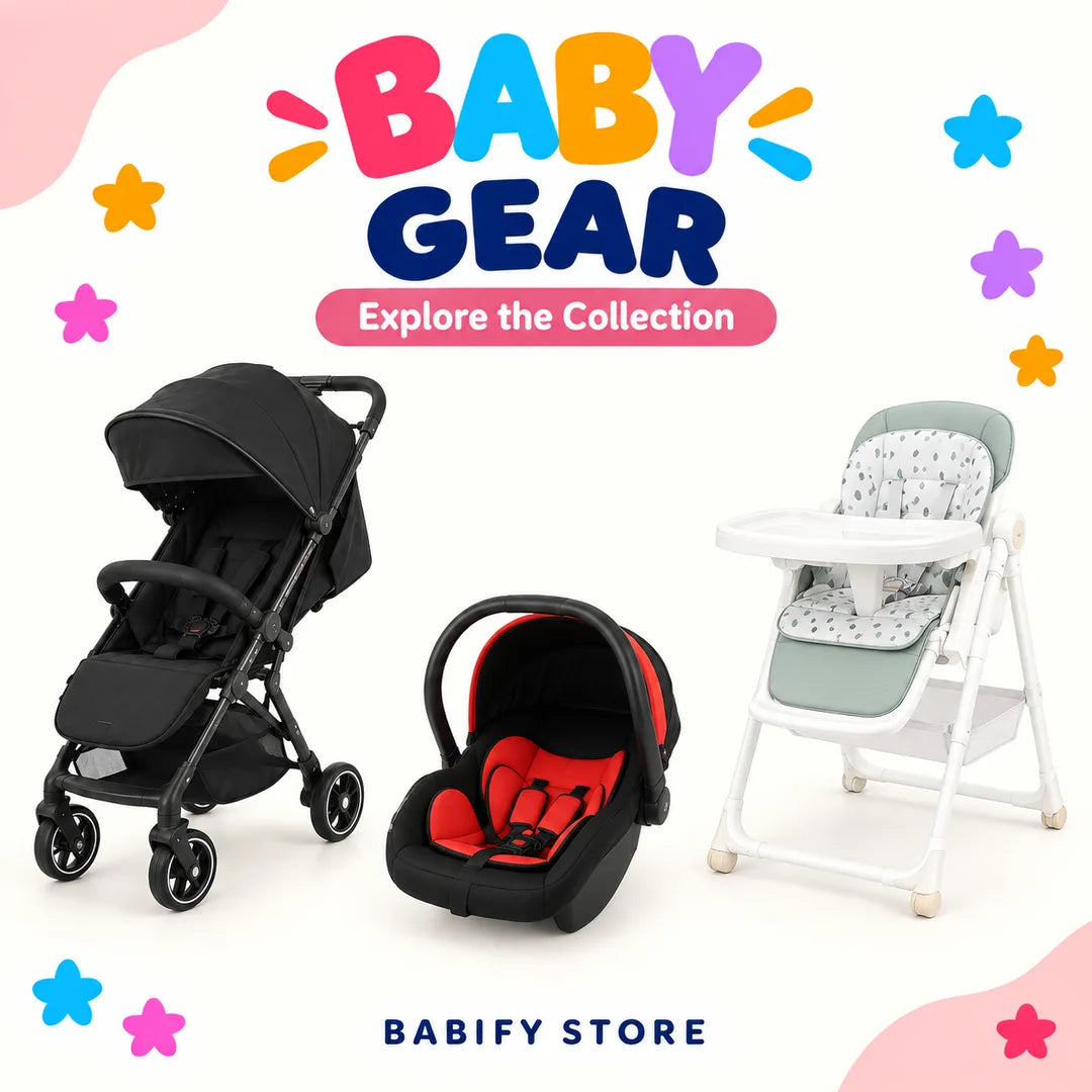 Baby wearing pink seated in a blue and white booster chair with a feeding tray and blue harness