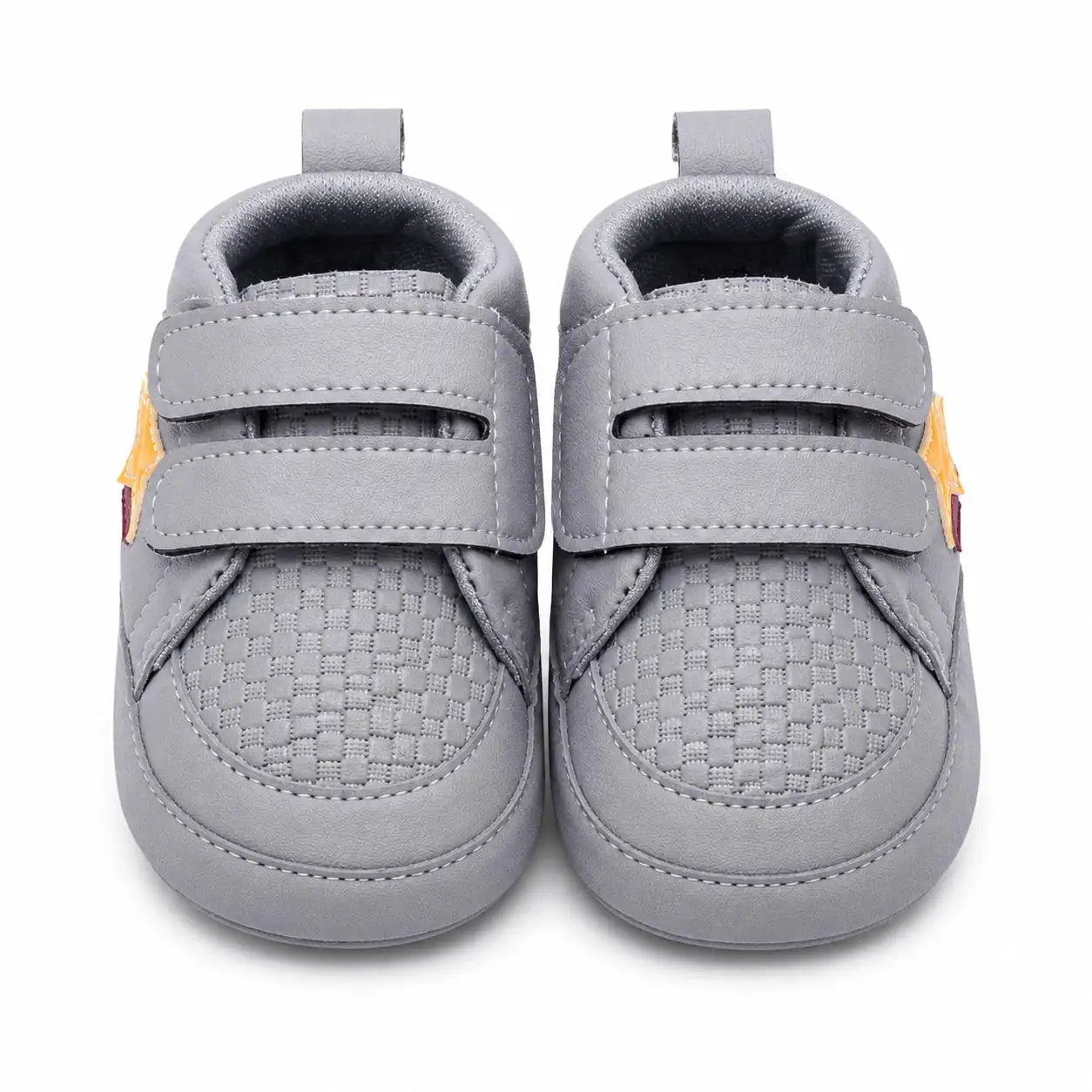Front view of grey baby first walker shoes with double hook and loop straps and breathable textured toe design