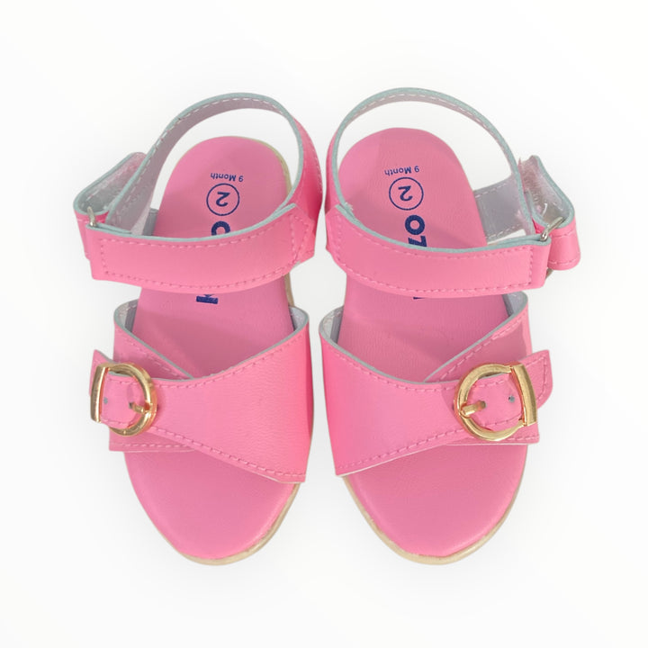 Pink baby sandals with breathable fabric, cushioned insole, and adjustable straps for a secure fit. Perfect for comfort and style.