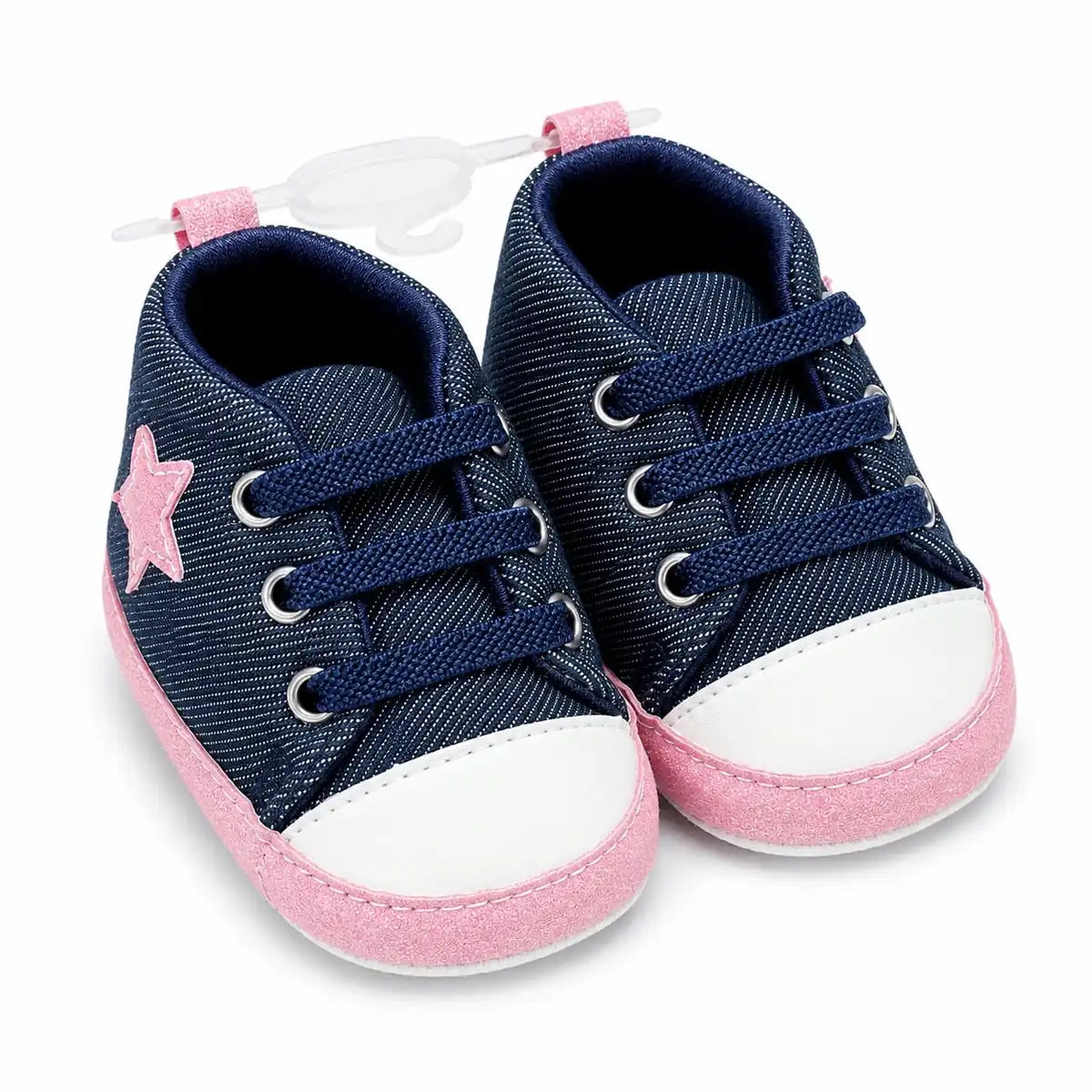 Navy blue denim baby first walker shoes with pink star detail, elastic laces and soft sole – angled view