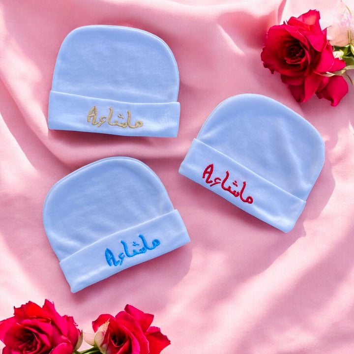 Pack of 3 soft cotton baby caps with "Masha Allah" embroidery in pastel colors.