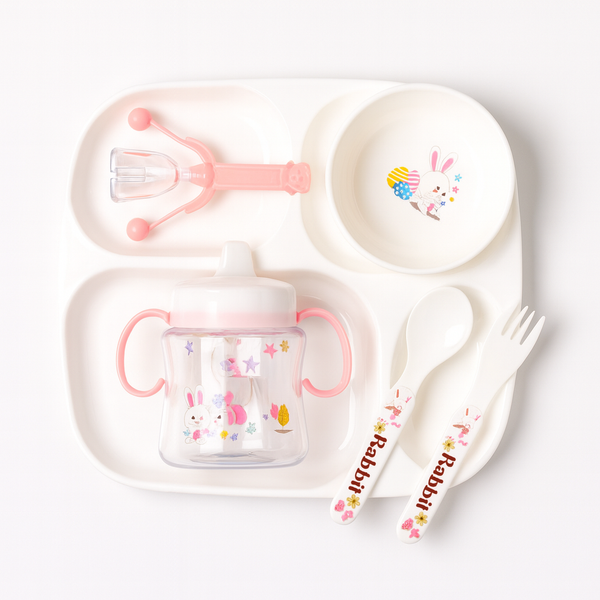 6-piece baby feeding set with rabbit design including bowl, plate, spoon, fork, spill-proof sippy cup, and straw bottle, made from BPA-free food-grade materials, perfect for self-feeding toddlers.