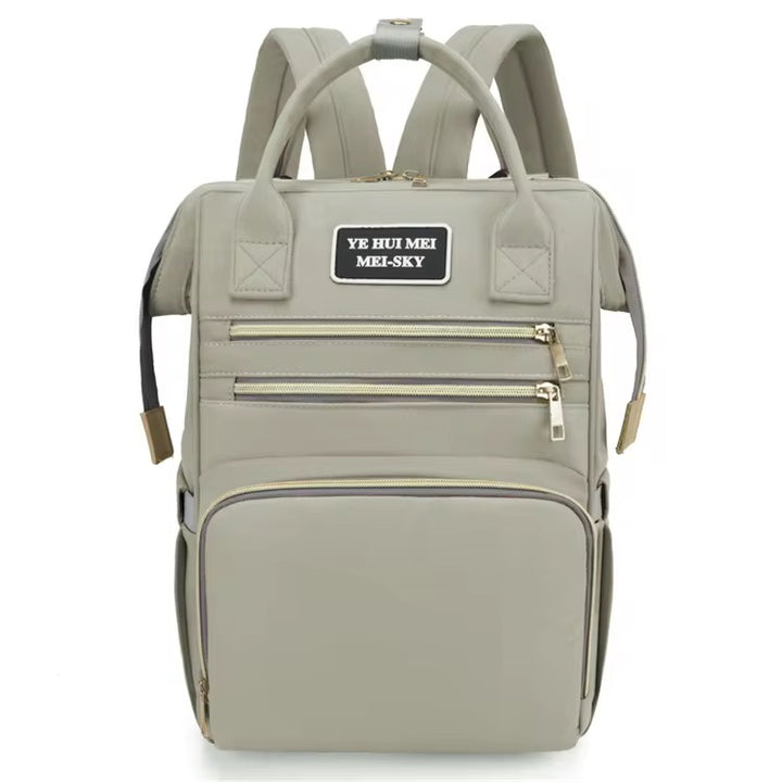 Premium baby diaper backpack with insulated bottle holders and multiple compartments – ideal for travel and daily use.