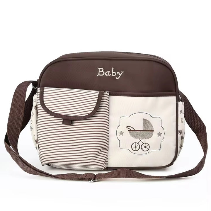 Stylish baby diaper bag with compartments and adjustable strap for travel and daily use