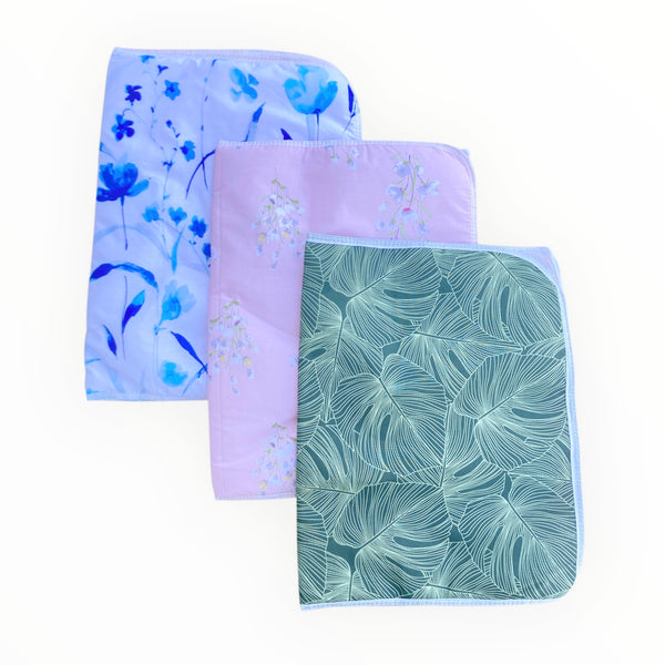 Soft, waterproof, and absorbent cotton baby changing sheet, perfect for diaper changes and tummy time.