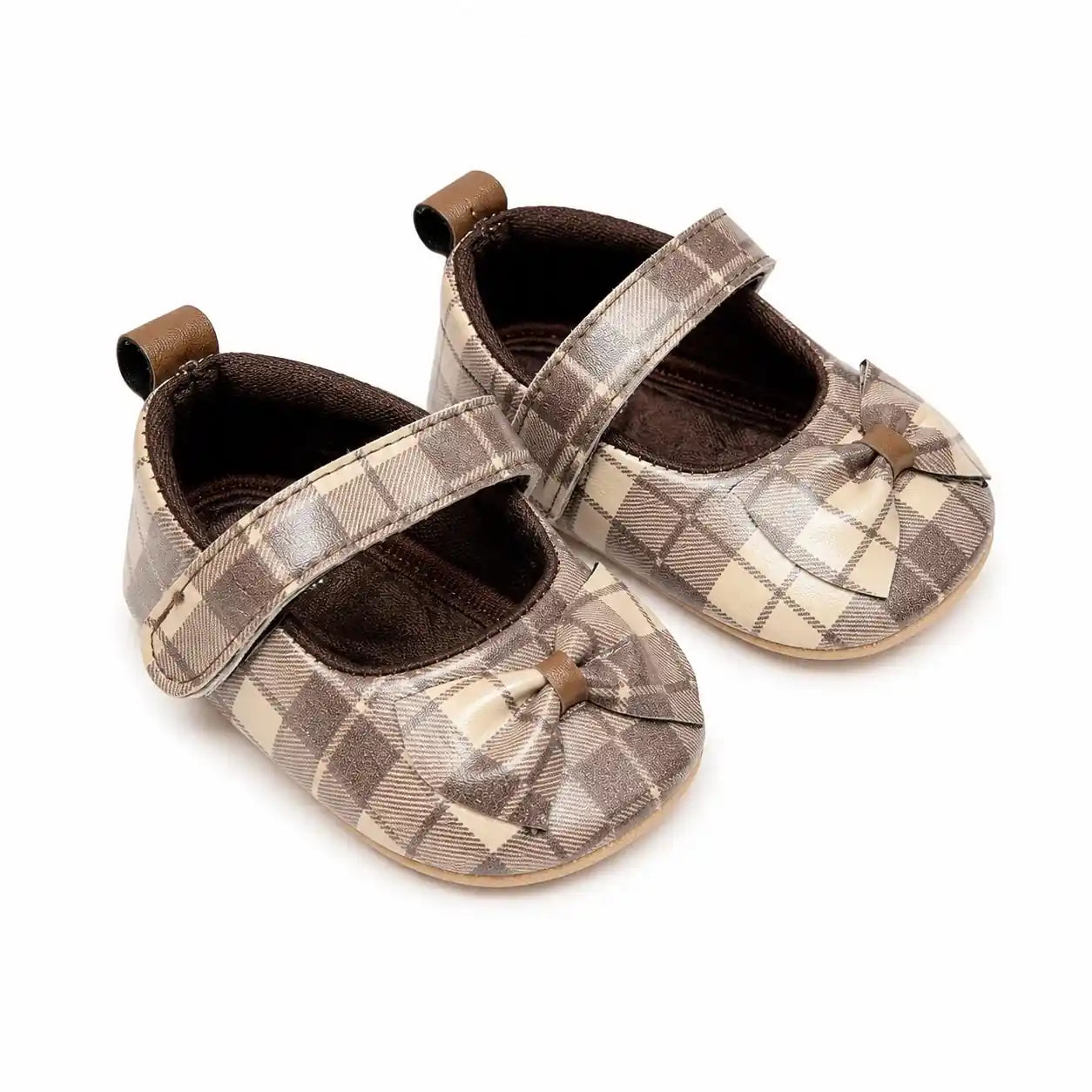 Beige and brown plaid baby girl soft sole Mary Jane shoes with decorative bow and hook-and-loop strap – angled view