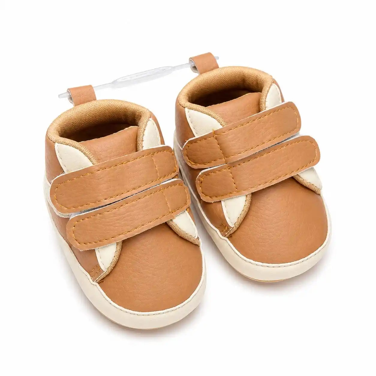 Camel beige baby soft sole first walker shoes with double hook-and-loop straps and white accents – angled view