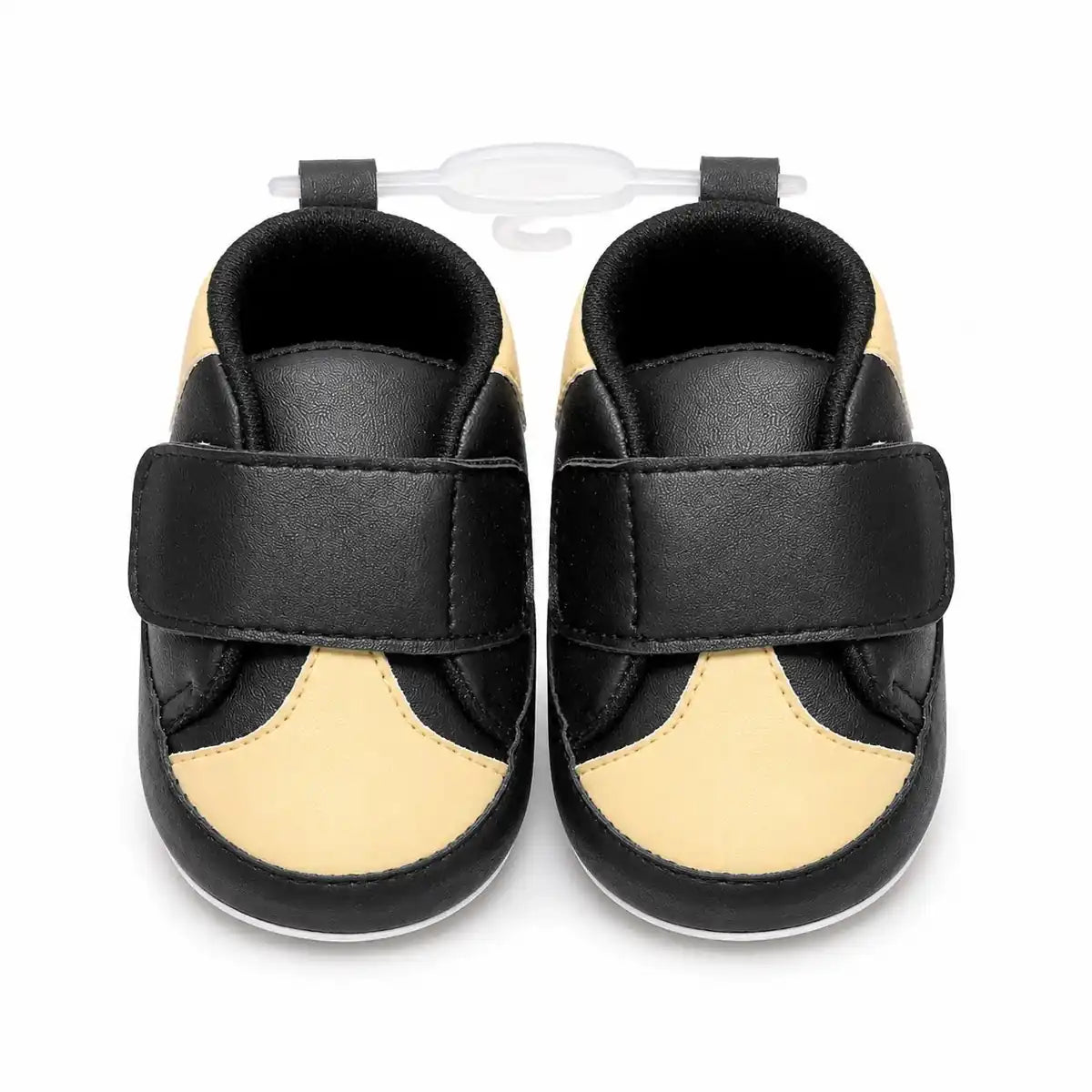 Baby black and beige soft sole first walker shoes with secure strap closure – front view