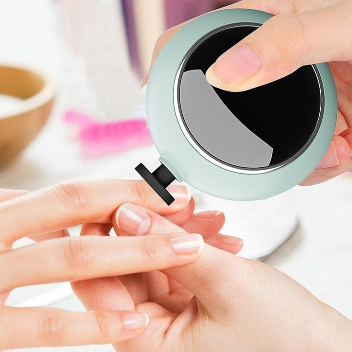 Battery-operated electric baby nail trimmer with 6 grinding heads and LED light for precise, safe, and gentle trimming. Includes a storage case for easy organization.