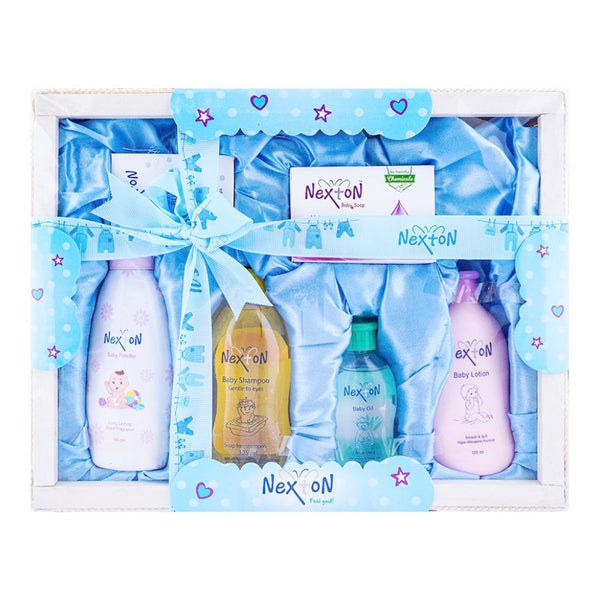 Nexton Baby Care Essentials Set with soap, powder, oil, shampoo, lotion, and cotton buds for gentle baby skincare.