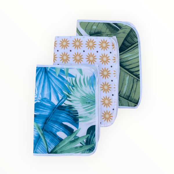 A soft, waterproof, and absorbent Baby Sozni Changing Sheet (23” x 15”) made of breathable cotton, designed