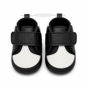 Black and white baby first walker shoes with wide strap and soft sole – front view