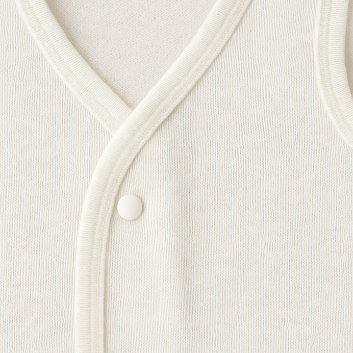 Pack of 3 baby banyans in white color with full sleeves and front button closure, made from soft interlock fabric