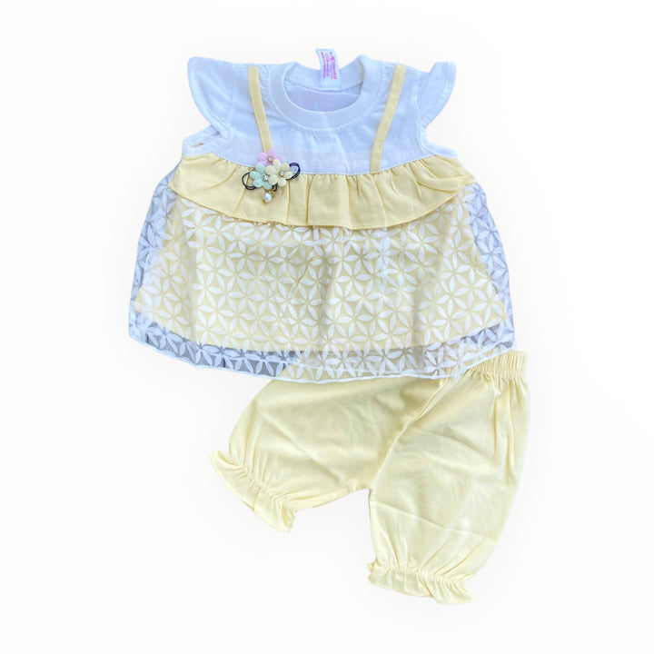  Soft cotton baby frock and pajama set, designed for comfort and style.