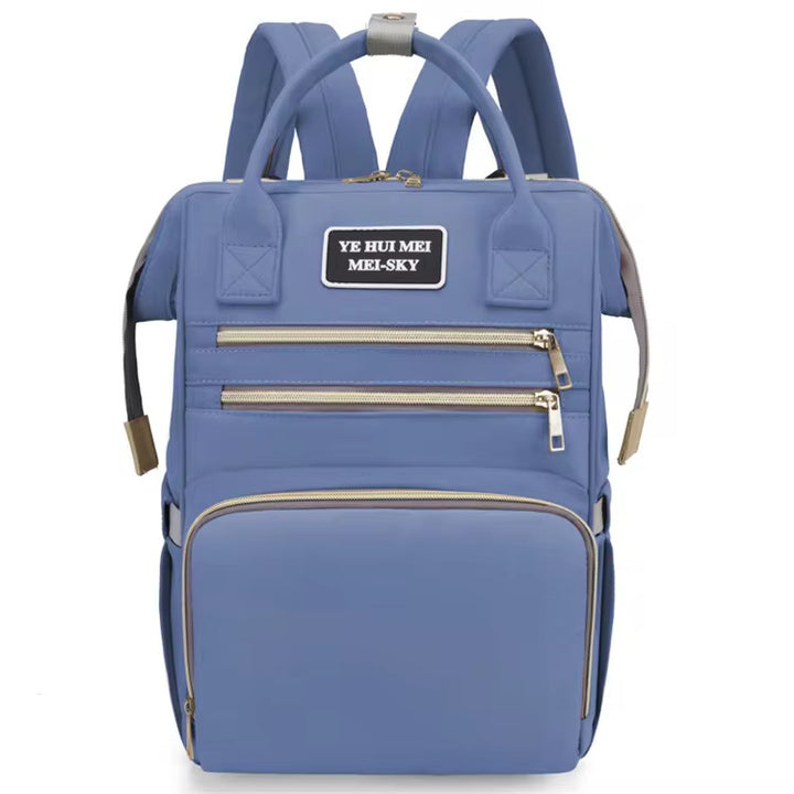 Premium baby diaper backpack with insulated bottle holders and multiple compartments – ideal for travel and daily use.