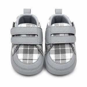 Grey plaid baby first walker shoes with double hook and loop straps – front view