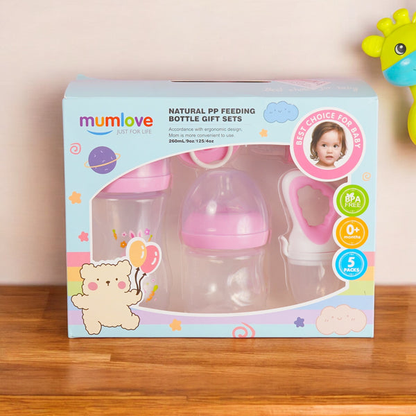Pink premium baby feeder & pacifier gift set, BPA-free, food-grade silicone, includes feeders, pacifiers, nasal aspirator & gift box for newborns.