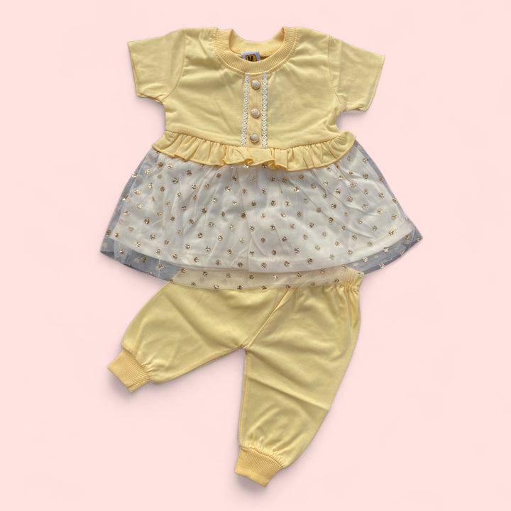Soft cotton baby Frock and pajama set, perfect for newborn comfort.