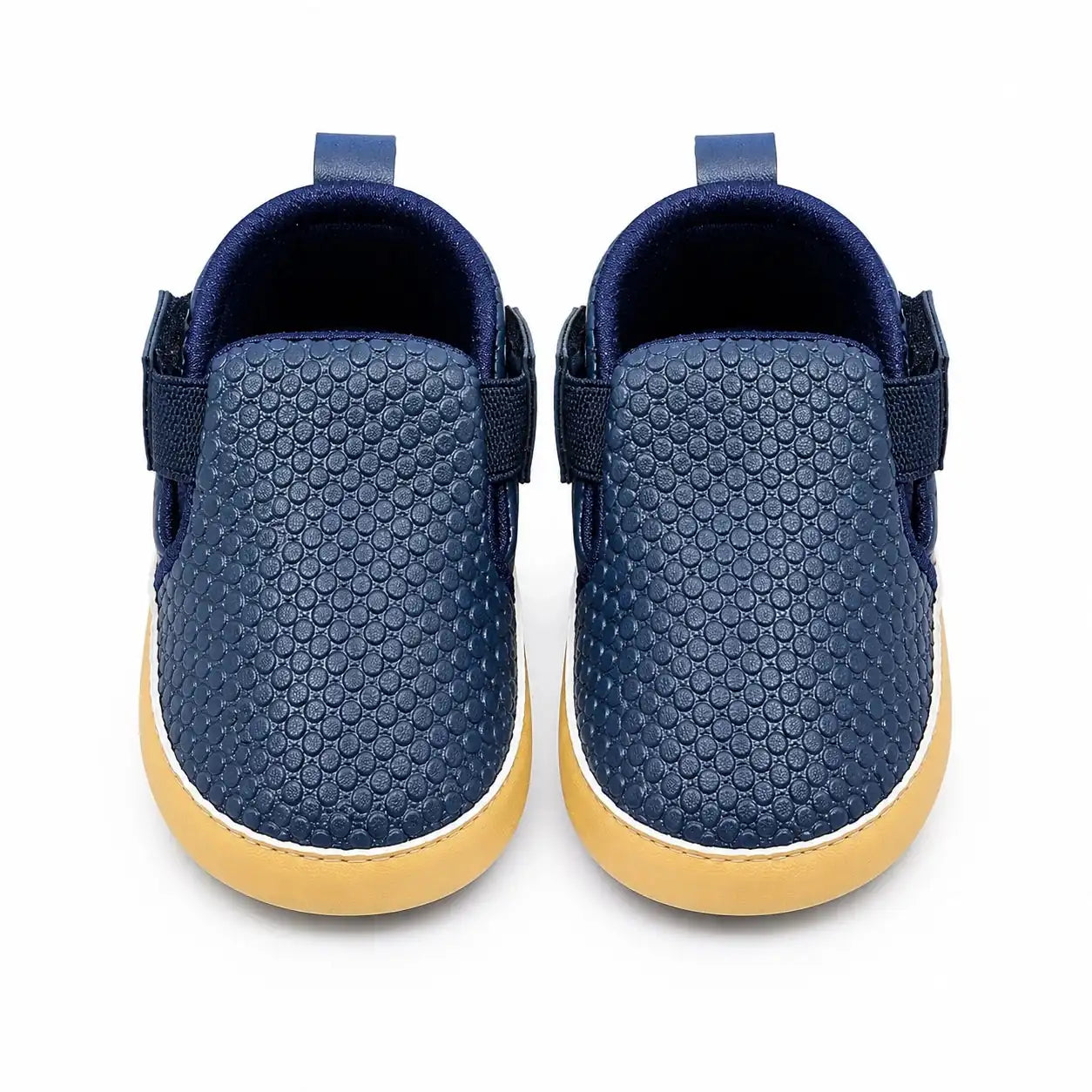 Navy blue textured slip-on baby first walker shoes with elastic side panels and soft sole – front view