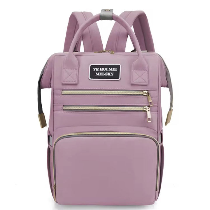 Premium baby diaper backpack with insulated bottle holders and multiple compartments – ideal for travel and daily use.