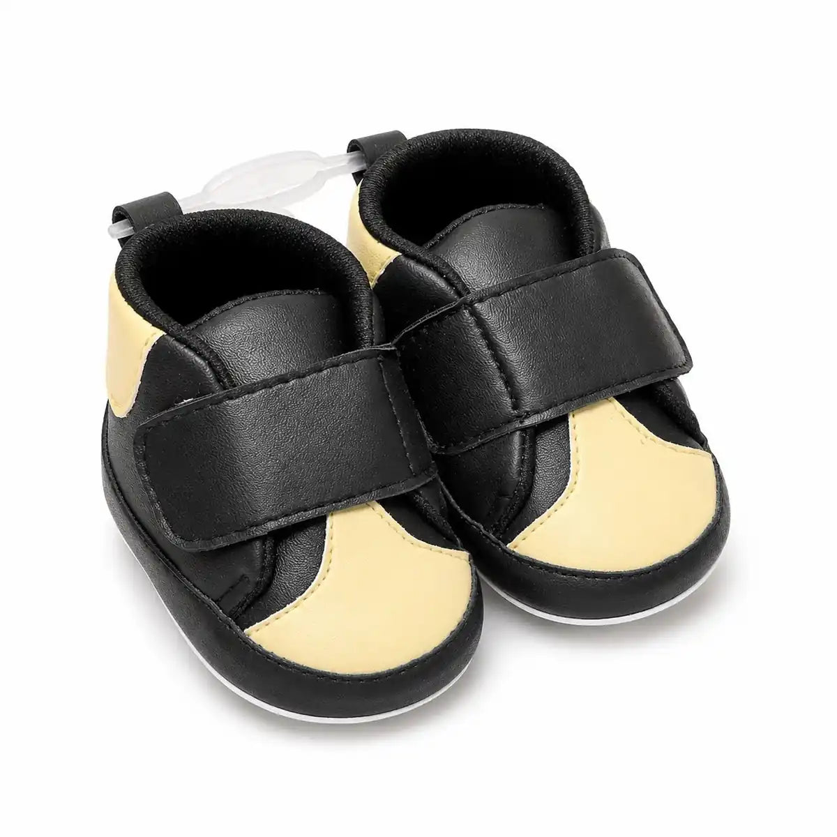 Black and beige baby first walker shoes with hook and loop strap and soft sole – angled view