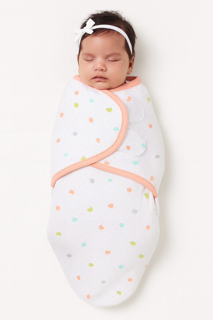 Pink adjustable infant swaddle wrap for newborns with Velcro closure