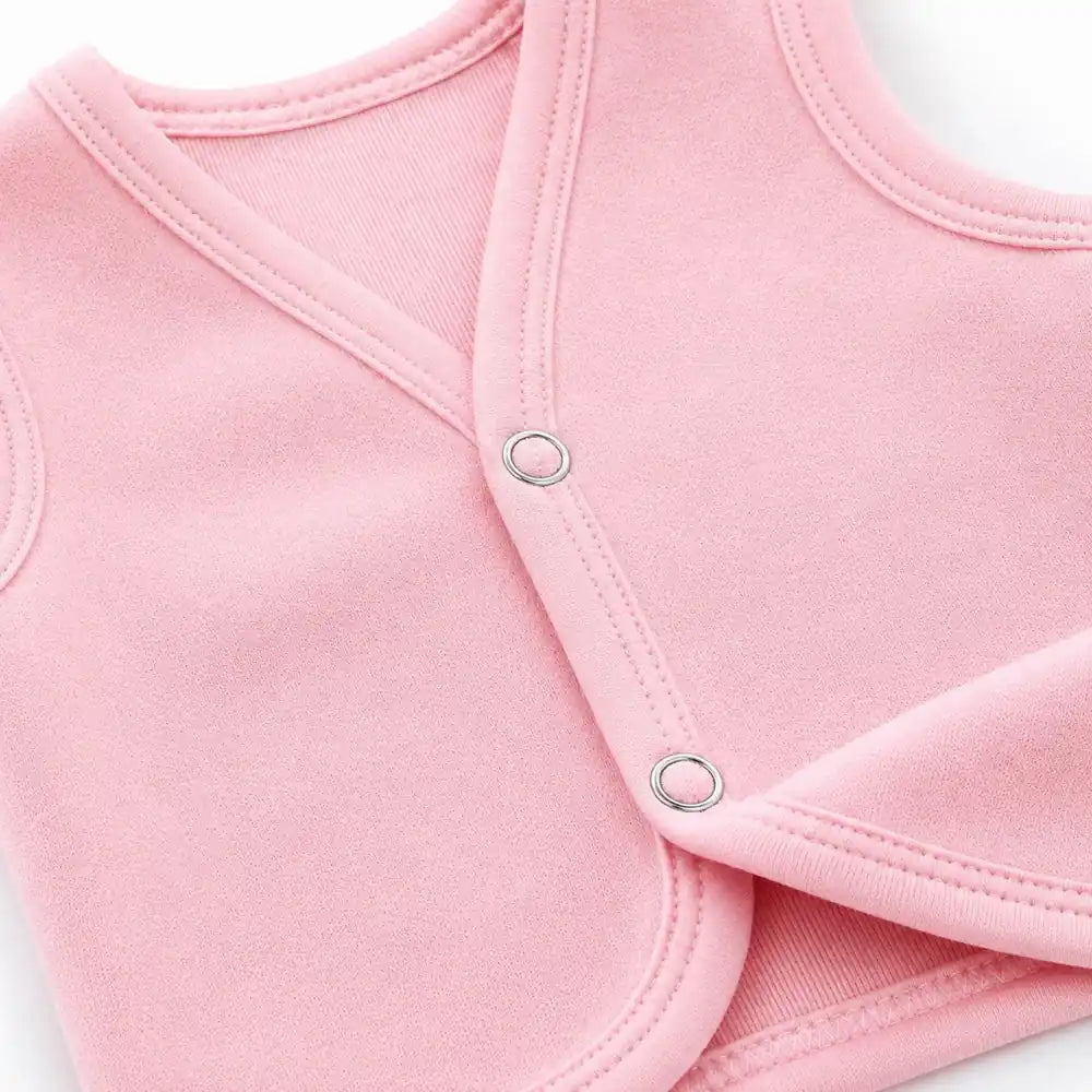 Pink baby sleeveless vest with snap buttons close up in Pakistan