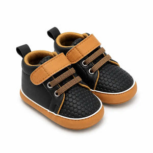 Black baby shoes with velcro strap and soft sole in Pakistan