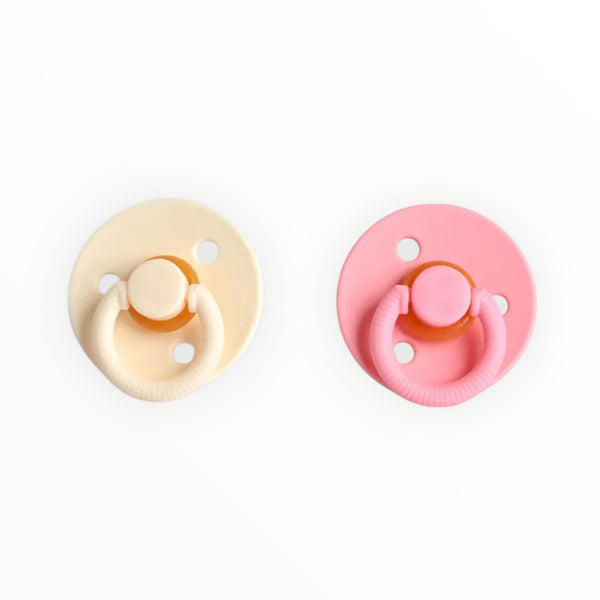 Set of 2 natural rubber baby soother pacifiers, BPA-free, soft, and orthodontic design for healthy oral development.