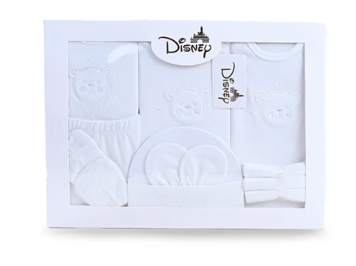 10-piece baby essentials set for newborns (0-6 months) featuring soft, breathable cotton items, including a bodysuit, shirt, pajama, mittens, booties, and more.