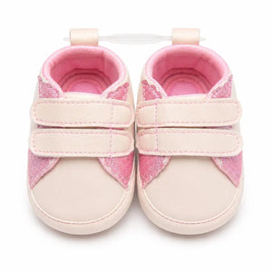 Baby girl pink glitter wing first walker shoes with double strap closure – front view