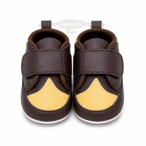 Brown and mustard baby first walker shoes with secure strap closure – front view