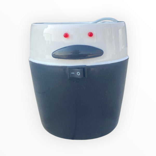 Electric baby bottle warmer for standard and wide-neck bottles, designed for day and night feeding convenience.