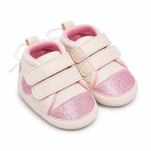 Cream pink baby girl first walker shoes with glitter toe cap and double hook and loop straps – angled view
