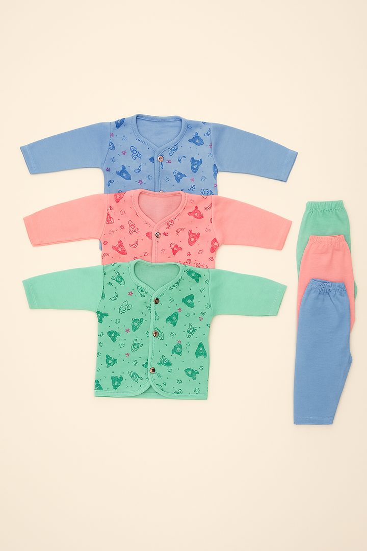 6-piece newborn baby shirt and pajama set with space-themed prints in pink, blue, and green – made from soft interlock cotton