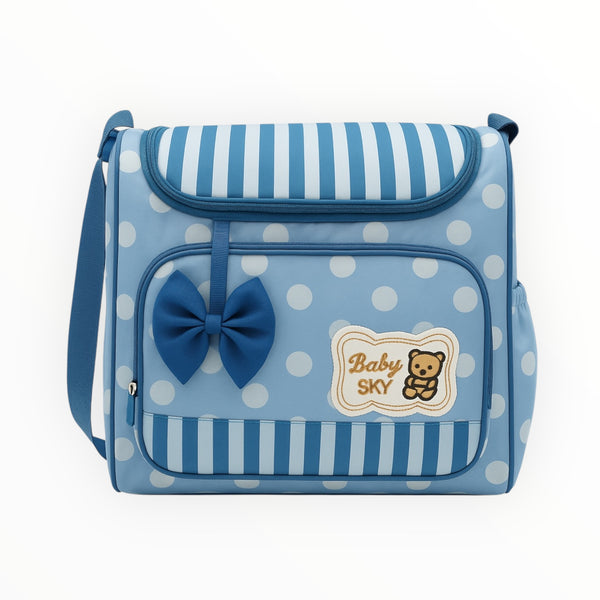 Polka dot diaper bag with bow, side bottle holder, and front pocket