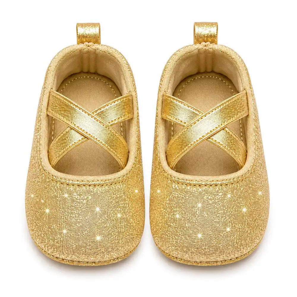 Golden glitter baby girl shoes with cross straps front view in Pakistan
