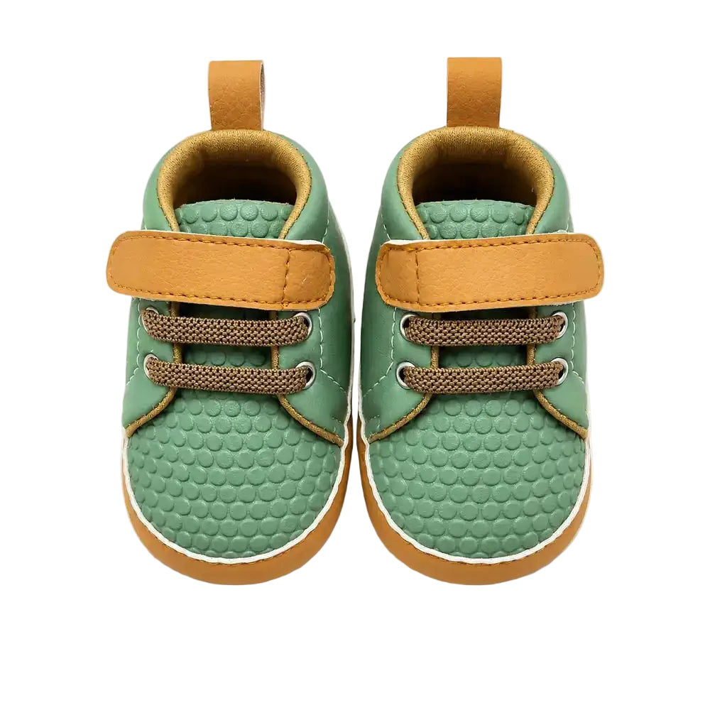 Green baby shoes with velcro strap front view in Pakistan