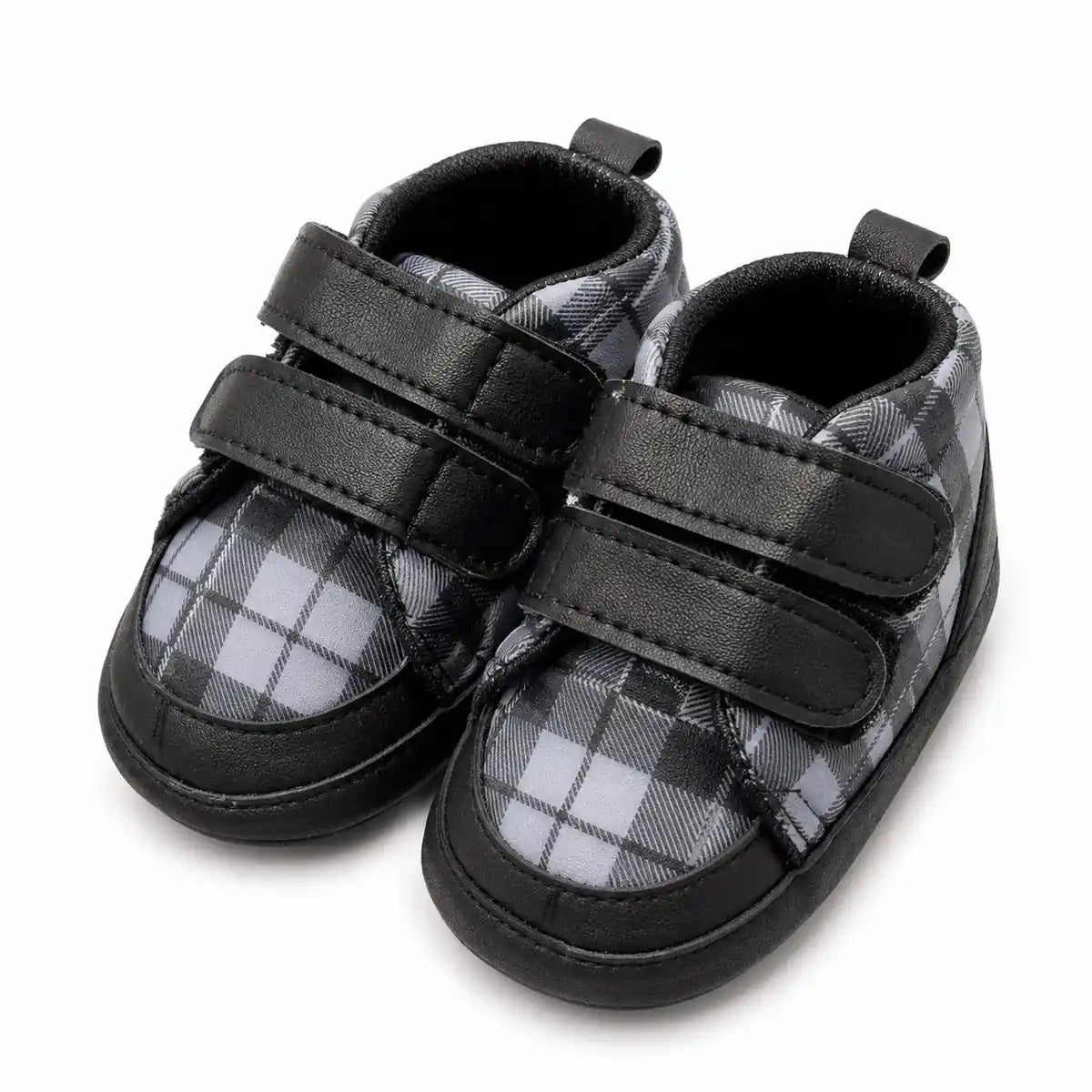 Black and grey plaid baby soft sole first walker shoes with double Velcro straps – angled view