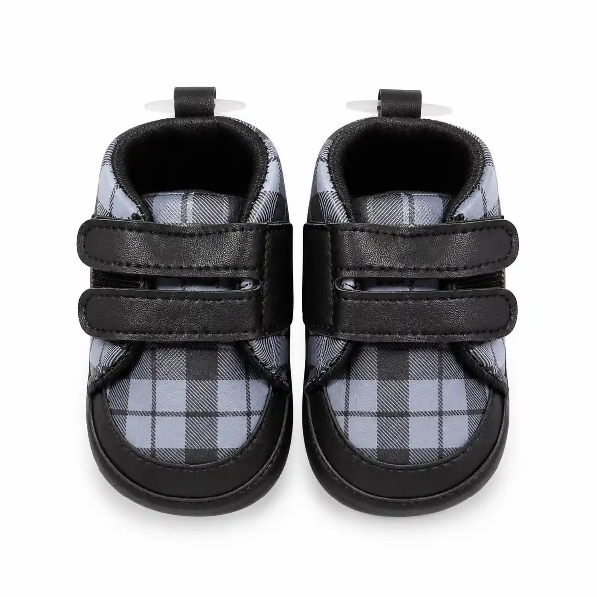 Black and grey checkered baby first walker shoes with double hook-and-loop straps – front view