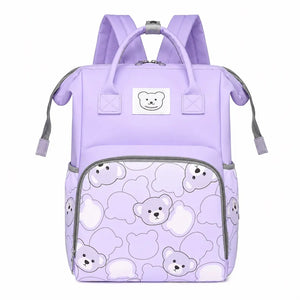 Lavender baby diaper bag backpack with bear print worn by mother