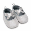Silver glitter baby girl shoes with cross straps in Pakistan