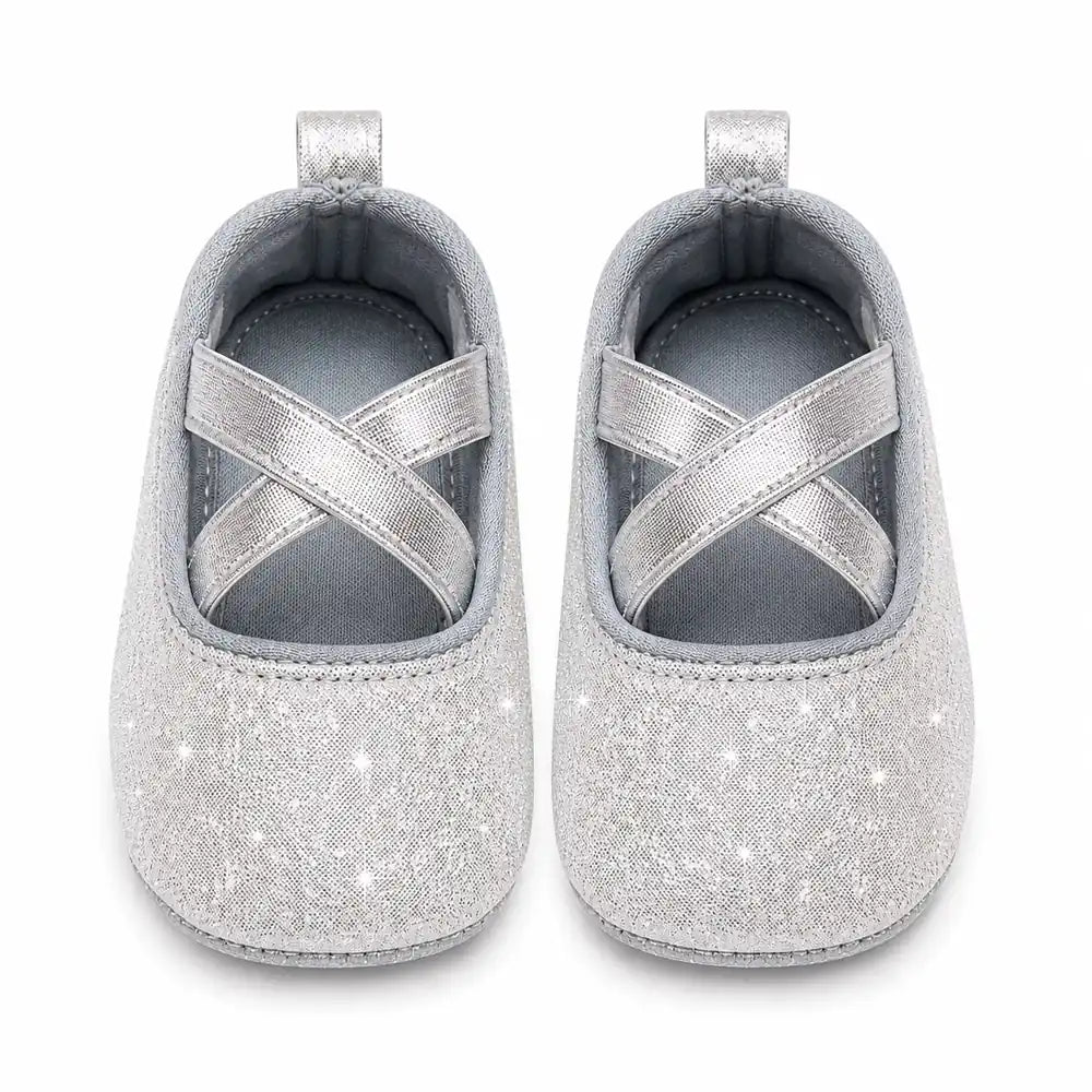 Silver glitter baby girl shoes with cross straps front view in Pakistan