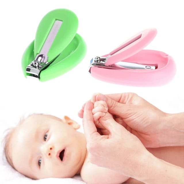 Compact and ergonomic baby nail clipper with rounded edges and safety guard, available in pink, blue, green, and orange.