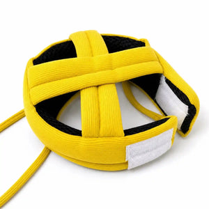 Yellow baby head safety helmet side view with soft protective padding