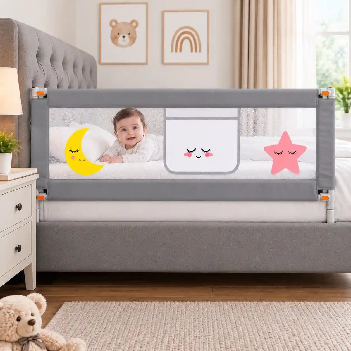 Grey baby bed safety rail with breathable mesh panel installed on bedside