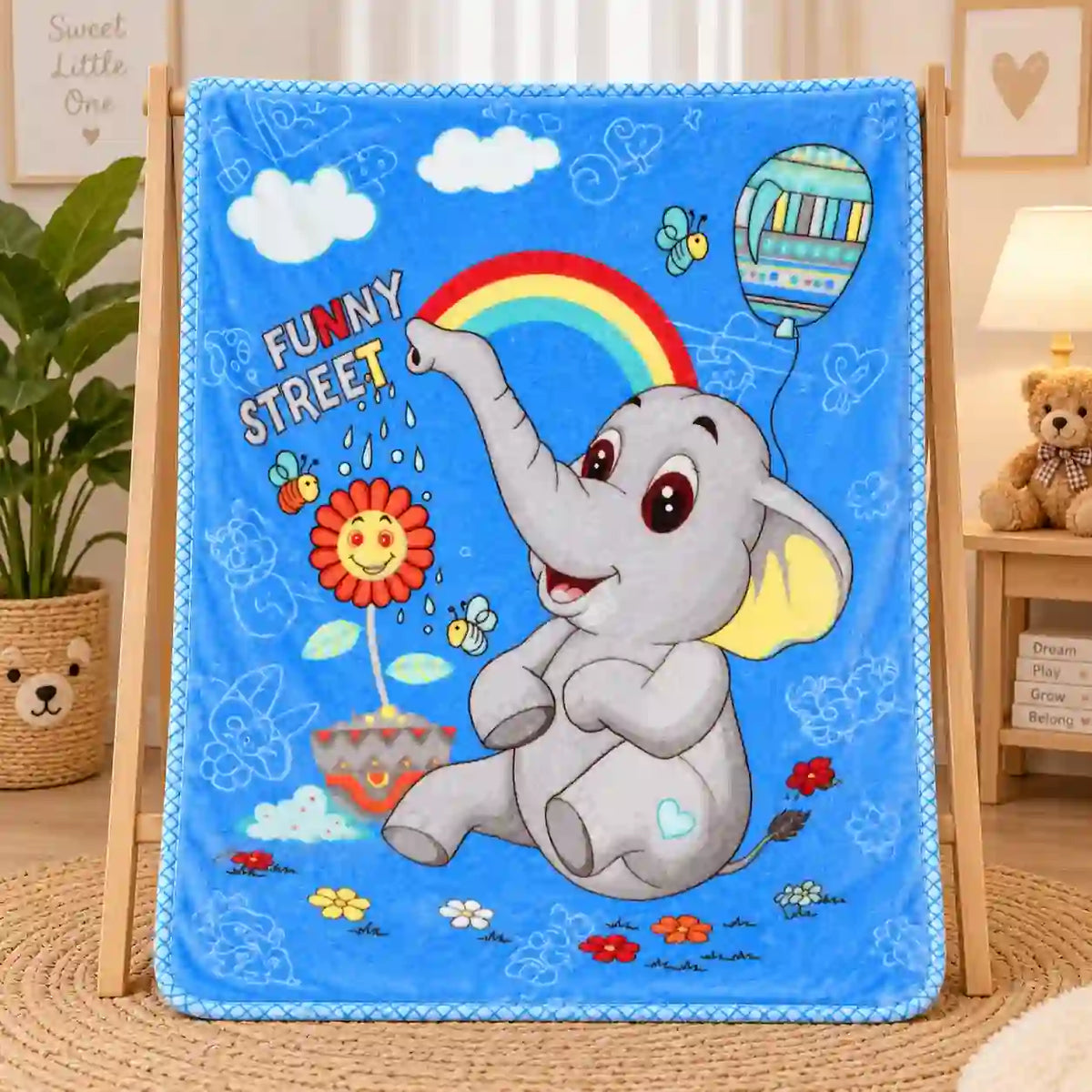 Blue baby blanket with cute elephant rainbow and floral print