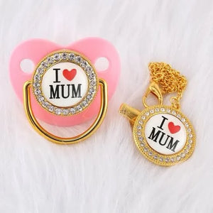 I Love Mum baby bling pacifier with matching clip on soft background 