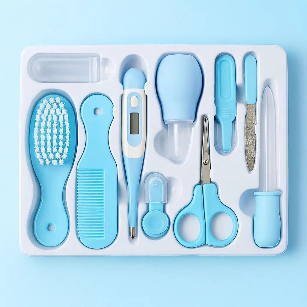 Blue baby grooming and healthcare kit with comb brush thermometer scissors and nasal aspirator