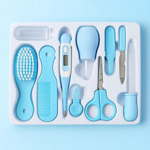 Blue baby grooming and healthcare kit with comb brush thermometer scissors and nasal aspirator